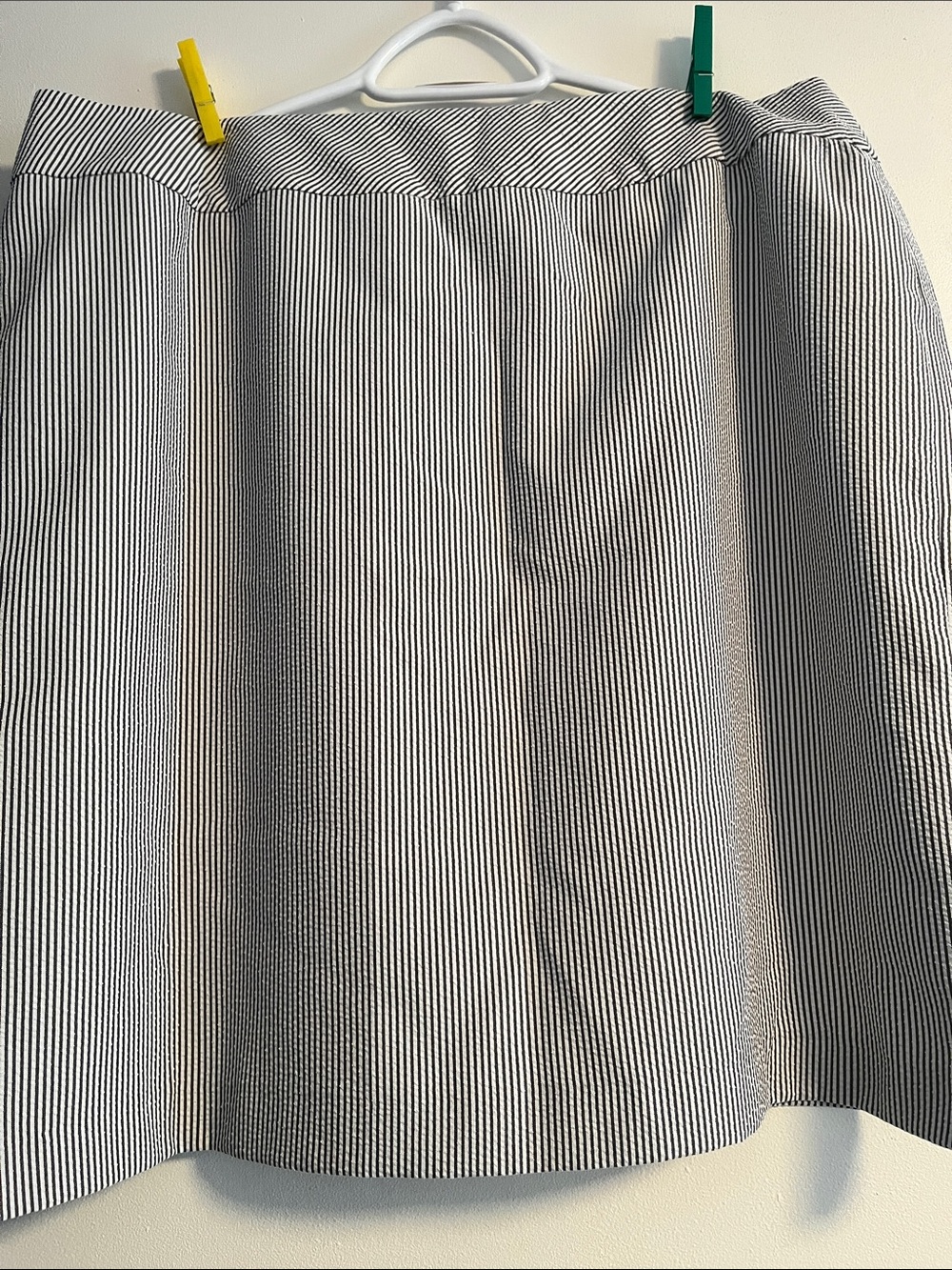Skirt, vertical stripes (gray or blue depending on lighting)